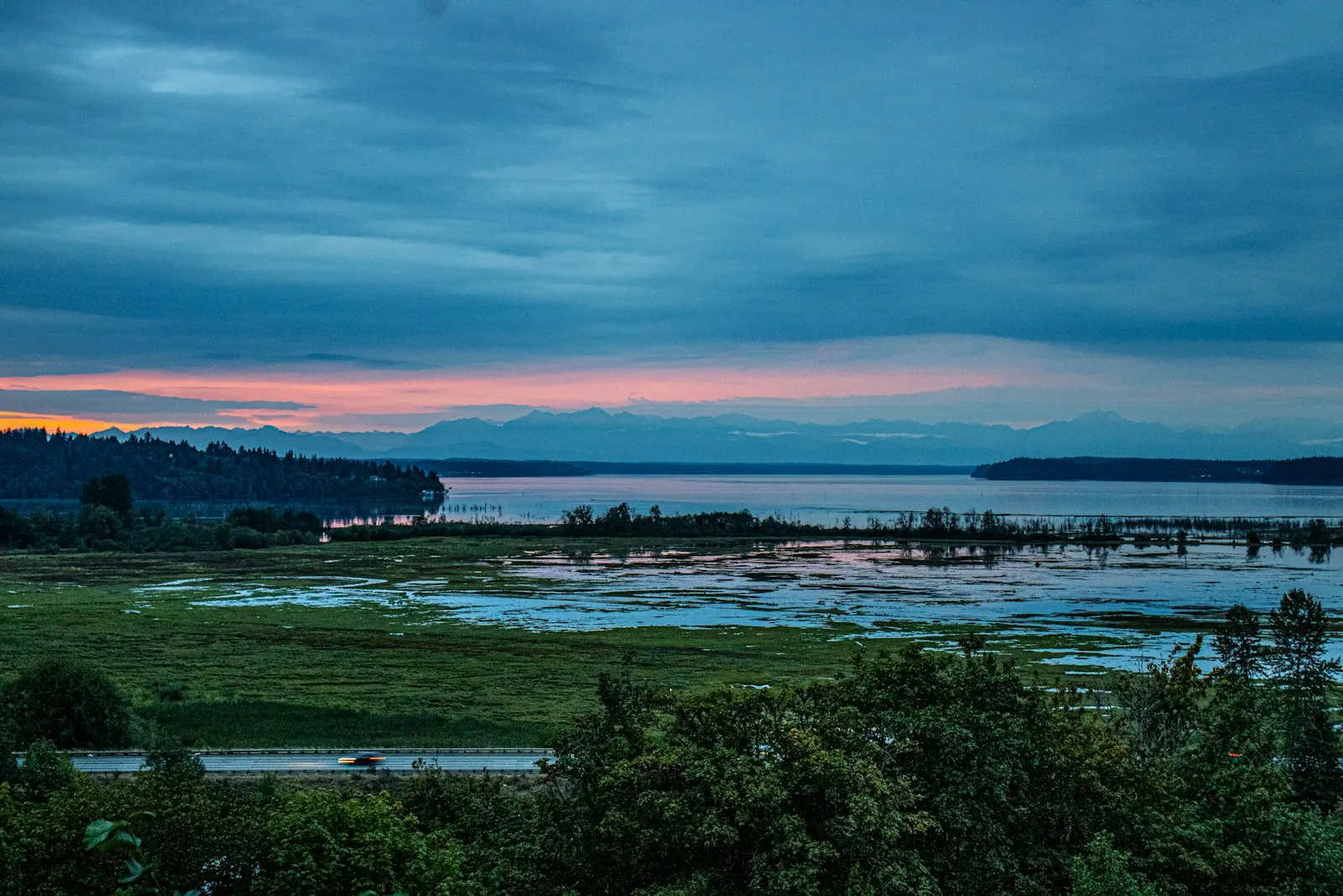 Sunset over the Snohomish River estuary and Puget Sound, the North Sound region served by our branch crews